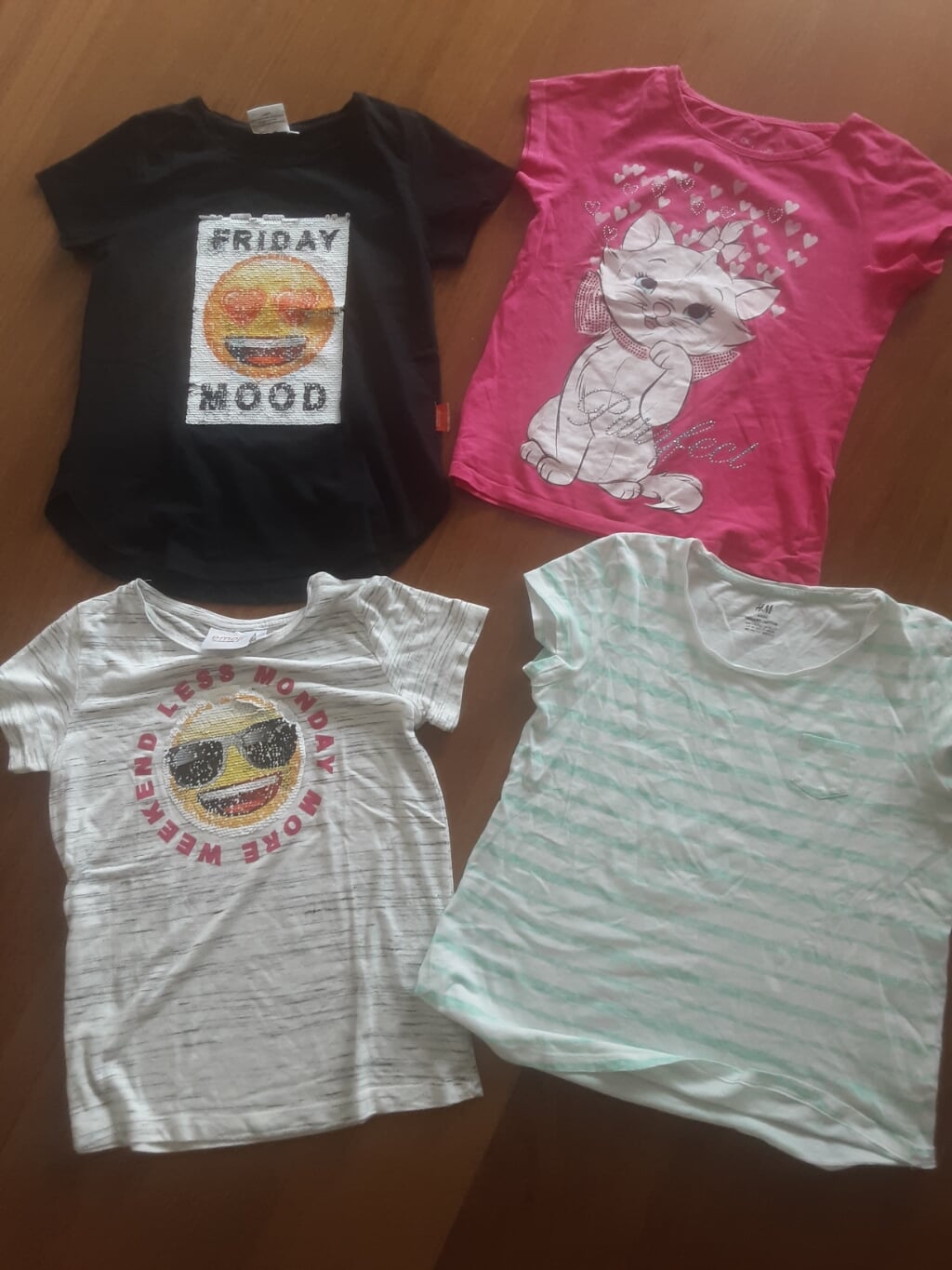 50% korting 4 leuke shirtjes meisjes mt 146/152 € 1,00 p.st