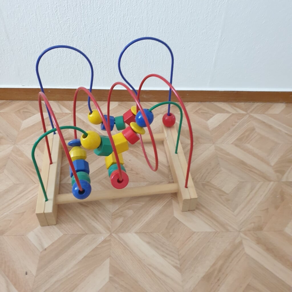 Speelgoed met houten kralen