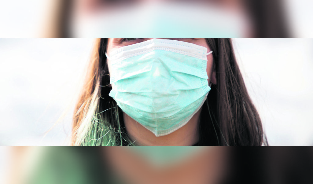 coronavirus global fight -woman wearing surgical mask
