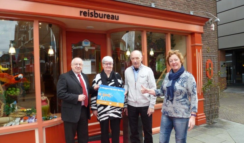 De overhandiging van de cheque.
