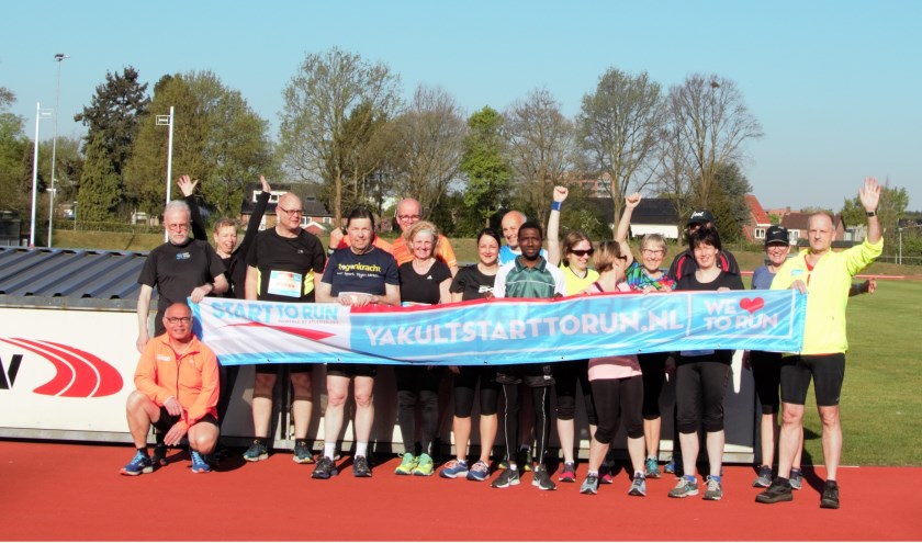 De deelnemers samen op de foto.