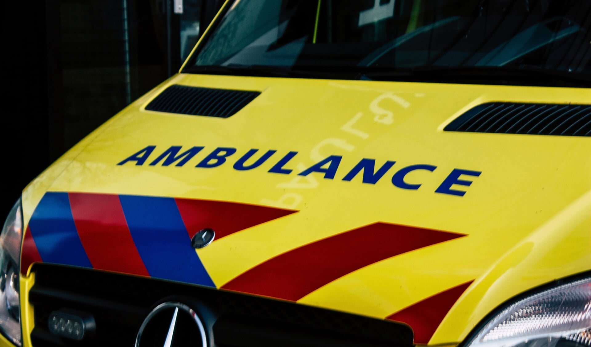 Rotterdam Netherlands April 1, 2019 View of a Dutch yellow ambulance parked in the streets of Rotterdam in the afternoon