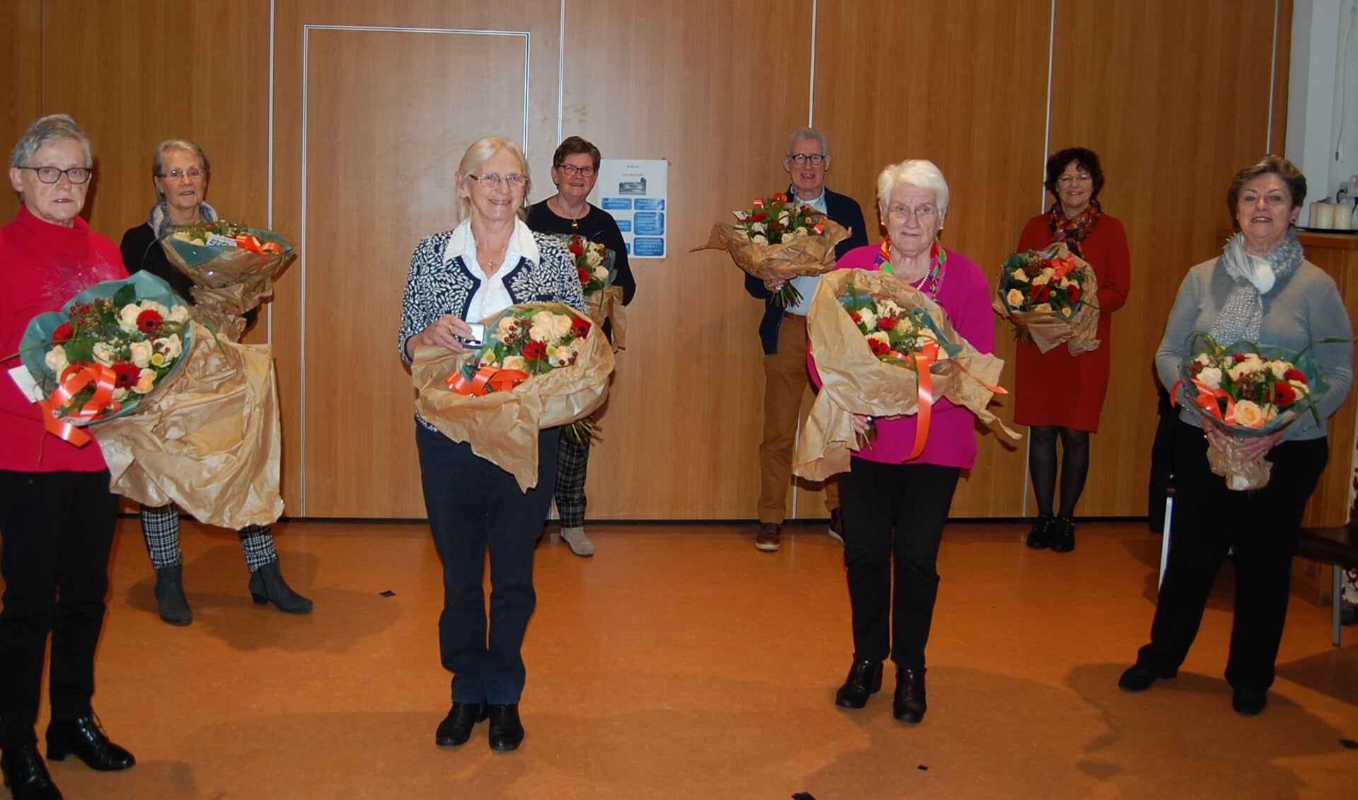 De acht jubilarissen van de afdeling Rooy van de Zonnebloem.