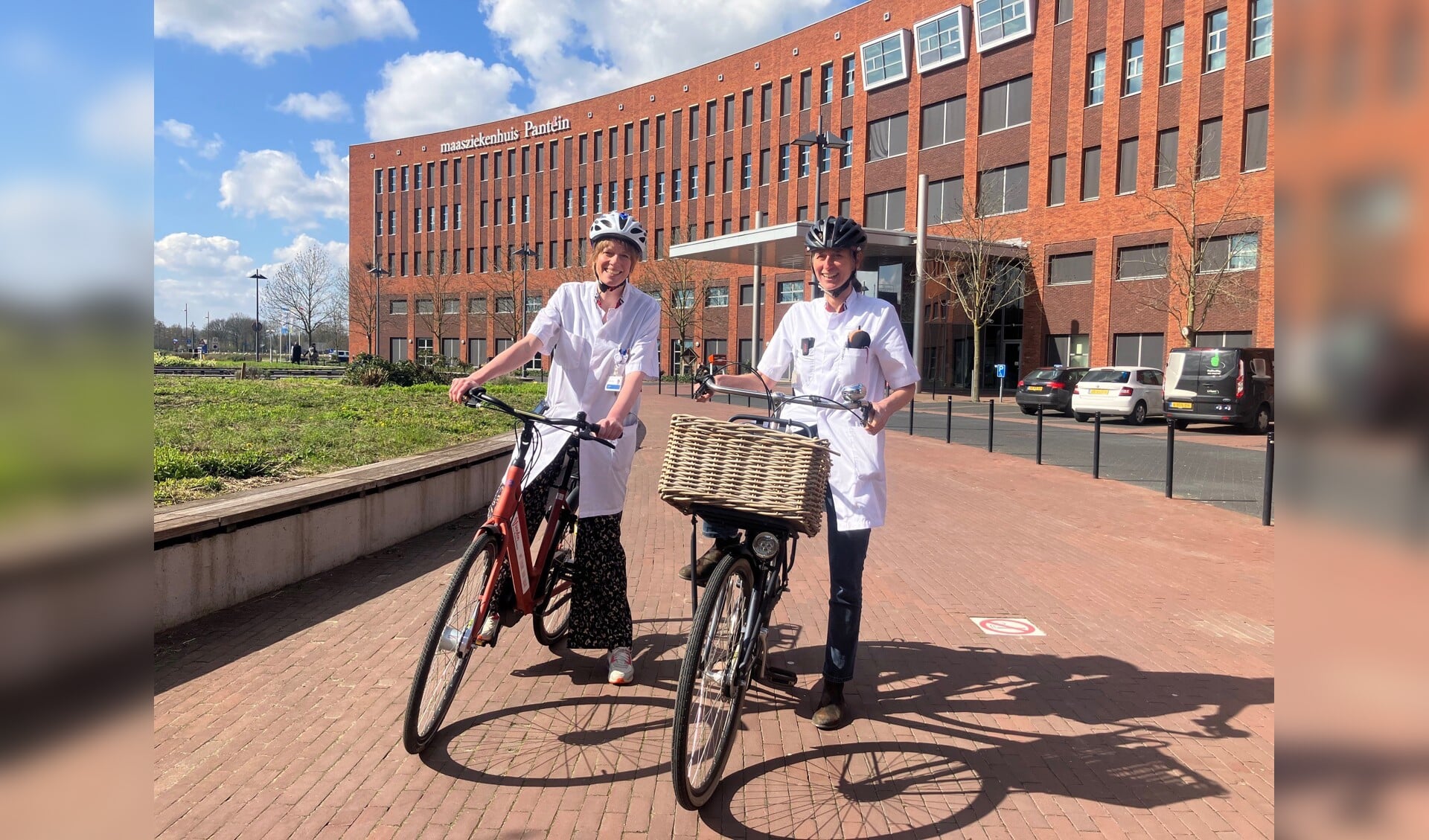 De neurologen Britt Hoffland en Ilja Bot promoten het gebruik van de fietshelm.