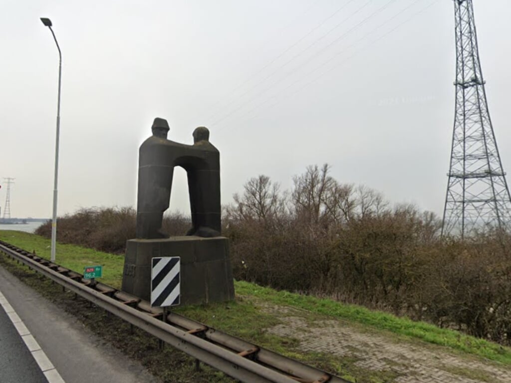 Arbeid en intellect reiken elkaar de hand, het monument bij de Haringvlietbrug.