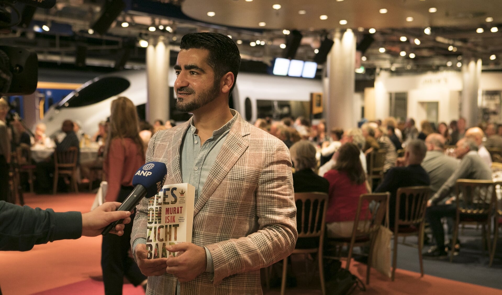 Murat Isik tijdens de bekendmaking van zijn nominatie. 