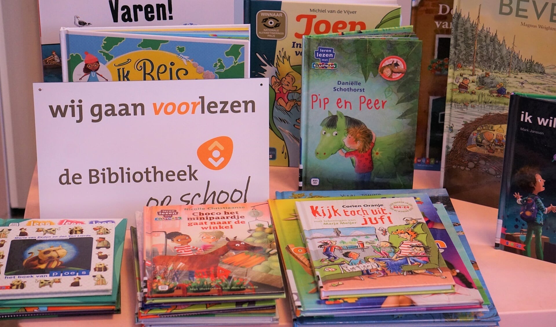 Bibliotheek op school: kinderen die plezier hebben in lezen behalen betere schoolresultaten.