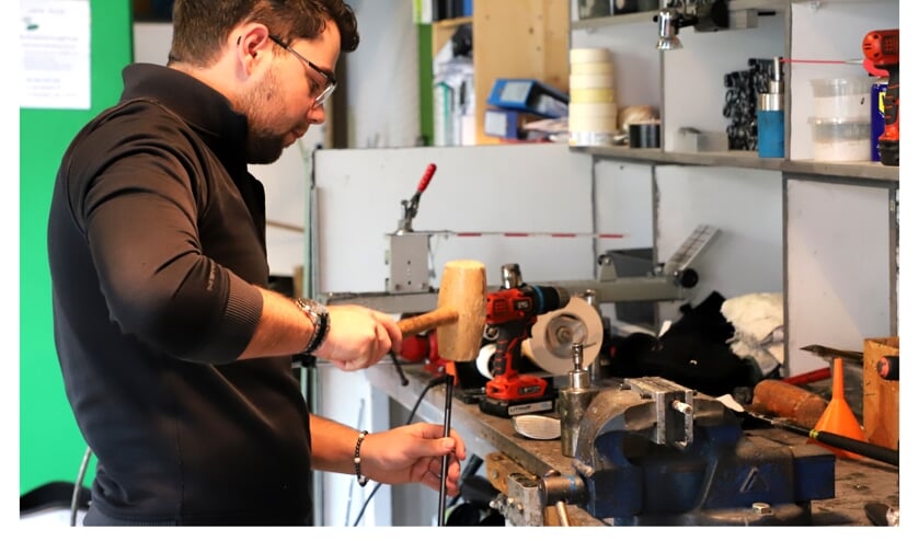 Maarten Fokker als fitter aan het werk bij Dutch Golf Club Fitter.
