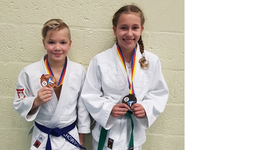 Thomas Vermeer met het brons en Xuxa Blom met haar gouden medaille.
