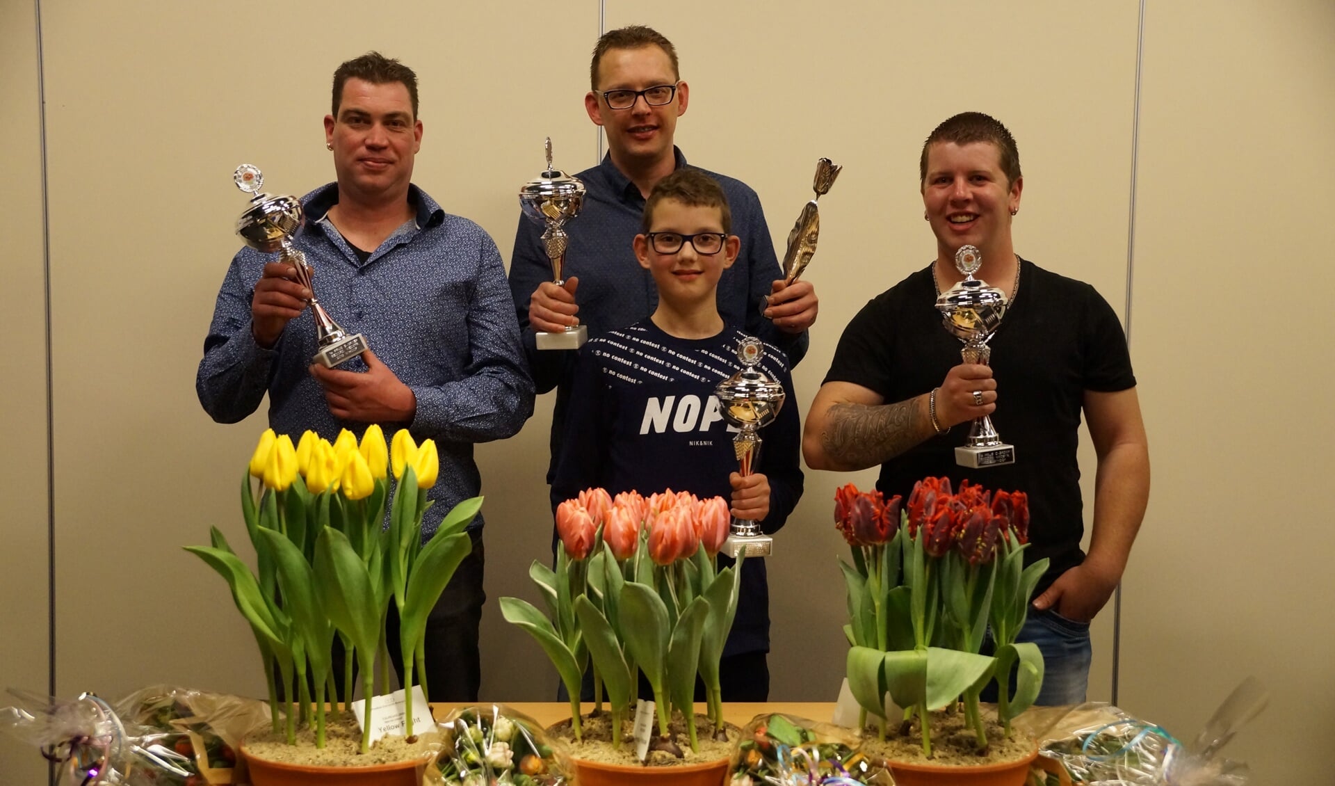 De vier prijswinnaars; Maurits Koeman, Ronald Mes, Lars Mes, Roel Kaagman.