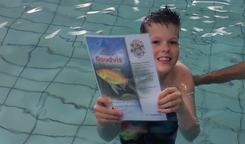 Tjez superblij met zijn diploma!