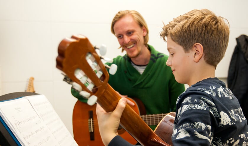 Of lekker gitaar spelen...