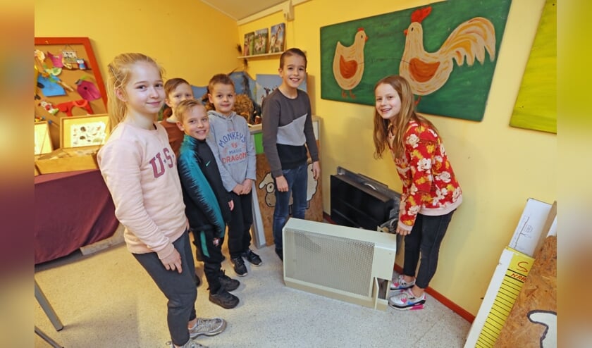 De leerlingenraad van de Paus Johannesschool hielp graag mee met de vervanging van de gasverwarming.