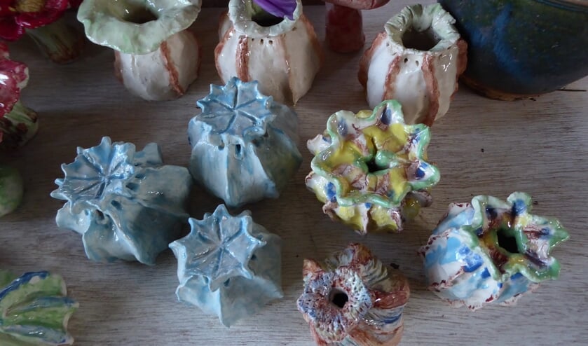Vrolijke potjes en bloemen om zelf te maken.