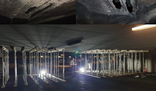 De schade aan het plafond van niveau -2 en de onderstempeling plafond niveau -2.