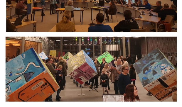 <p pstyle="PLAT">Presentatie van de kinderen in de gemeenteraad bij de opening van ‘Heemskerk in 2040’.</p>