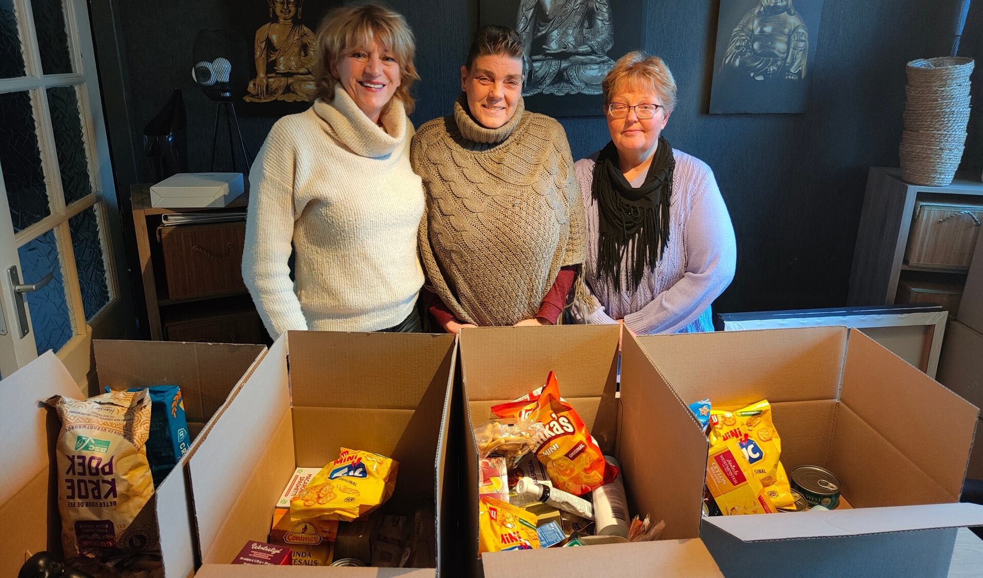 Het team achter de succesvolle Kerstpakkettenactie.