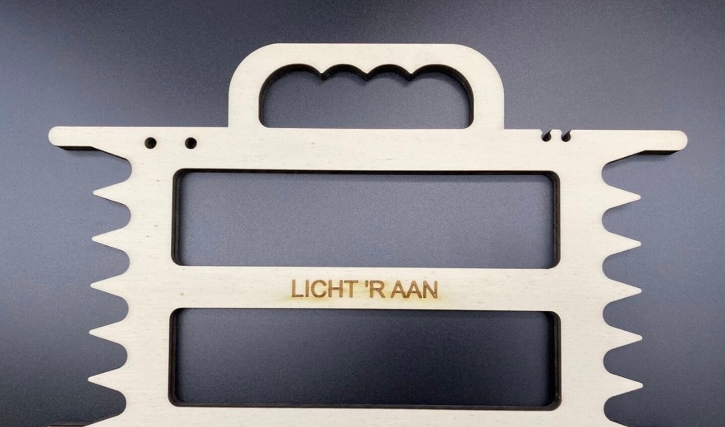 De Licht 'R Aan verlichtingshaspel, om te voorkomen dat kerstverlichting in de knoop raakt.