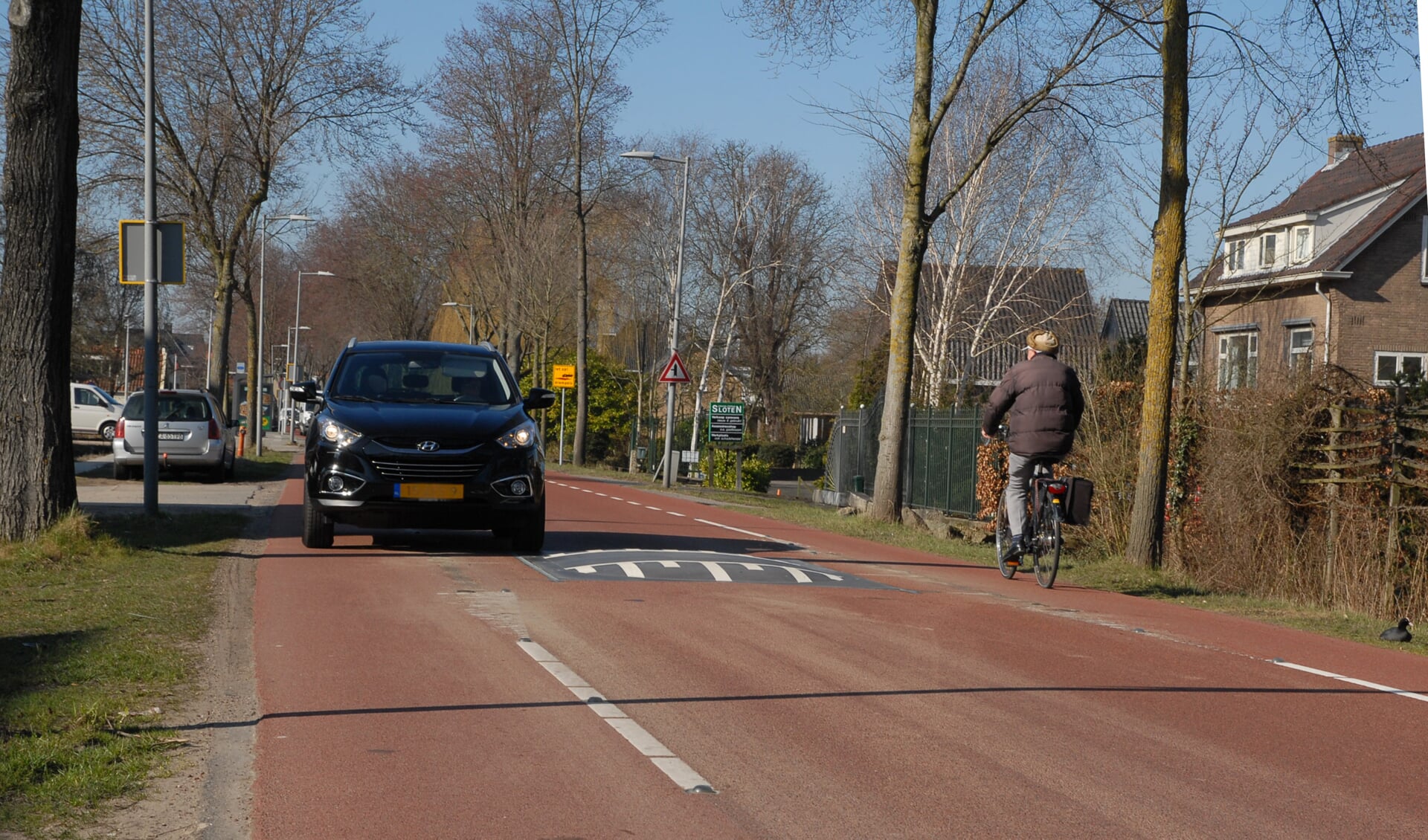 De Sloterweg lijkt op de foto een veilige weg, maar er rijdt teveel verkeer en daardoor ontstaan er gevaarlijke situaties. 