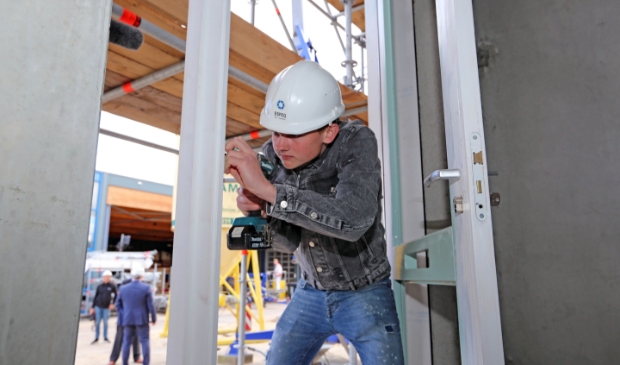 Leerling aan het werk in de bouwplaats die nooit af is.