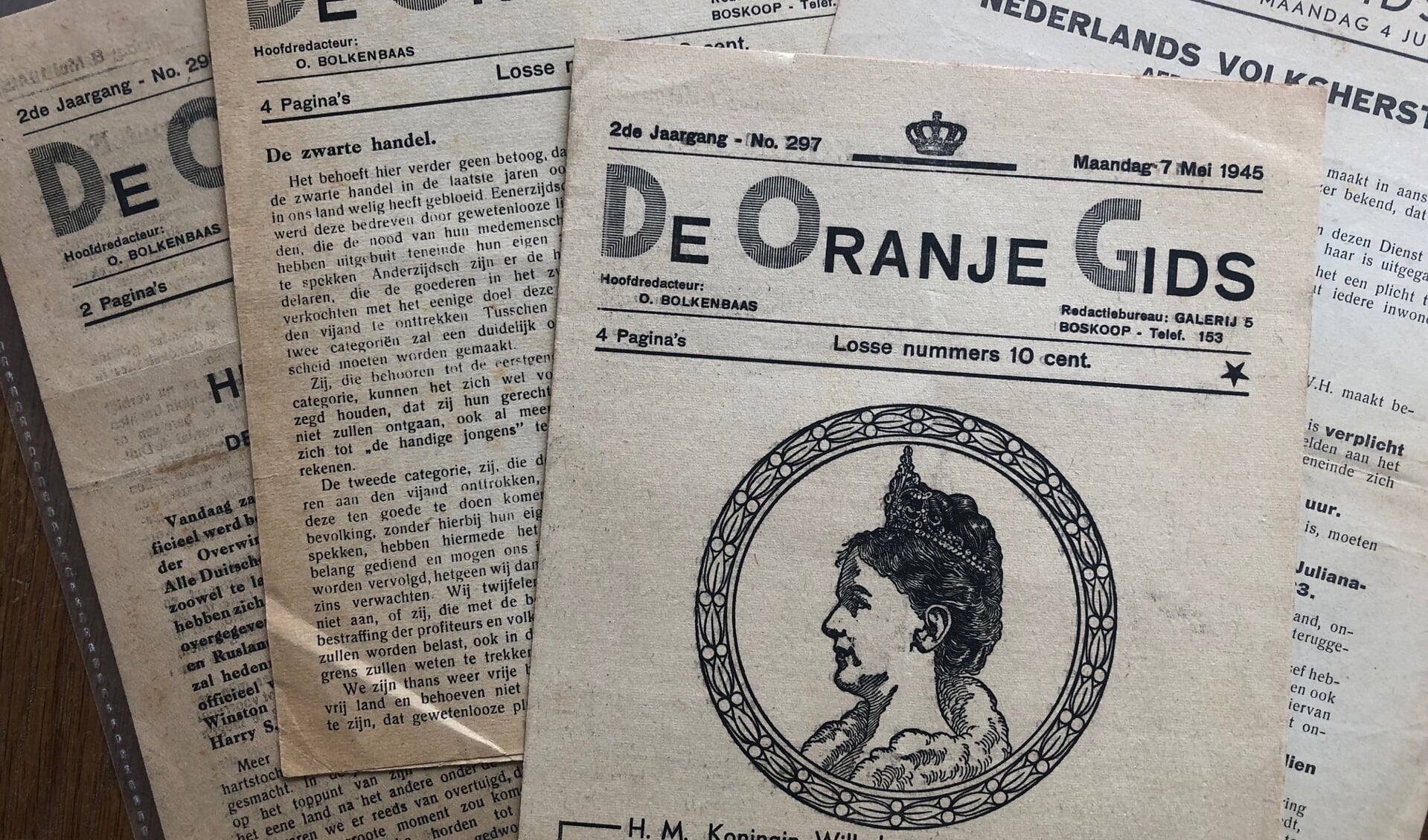 Enkele exemplaren van De Oranje Gids, het illegale krantje dat in de oorlog in Boskoop werd uitgegeven. 