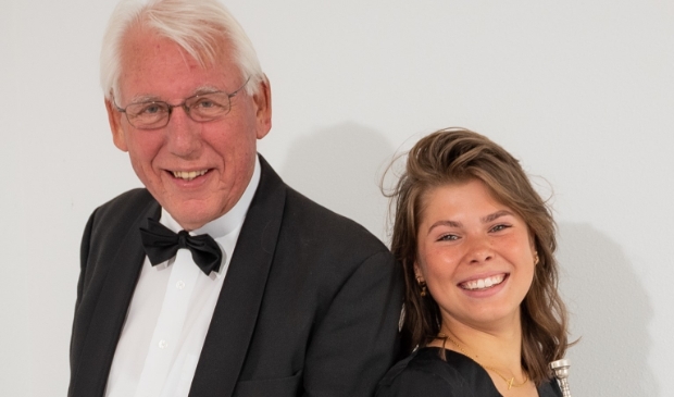 <p>Luc Mager (tubaïst, voormalig dirigent en 60 jaar lid van Amicitia) en Lisa Ruijsenberg (trompettist, begeleider jeugd en lid commissie 130 jaar Amicitia).</p>