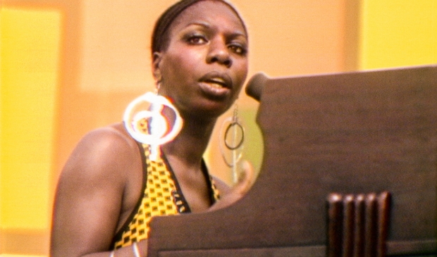 <p>Nina Simone in SUMMER OF SOUL. Photo Courtesy of Searchlight Pictures. © 2021 20th Century Studios All Rights Reserved</p>