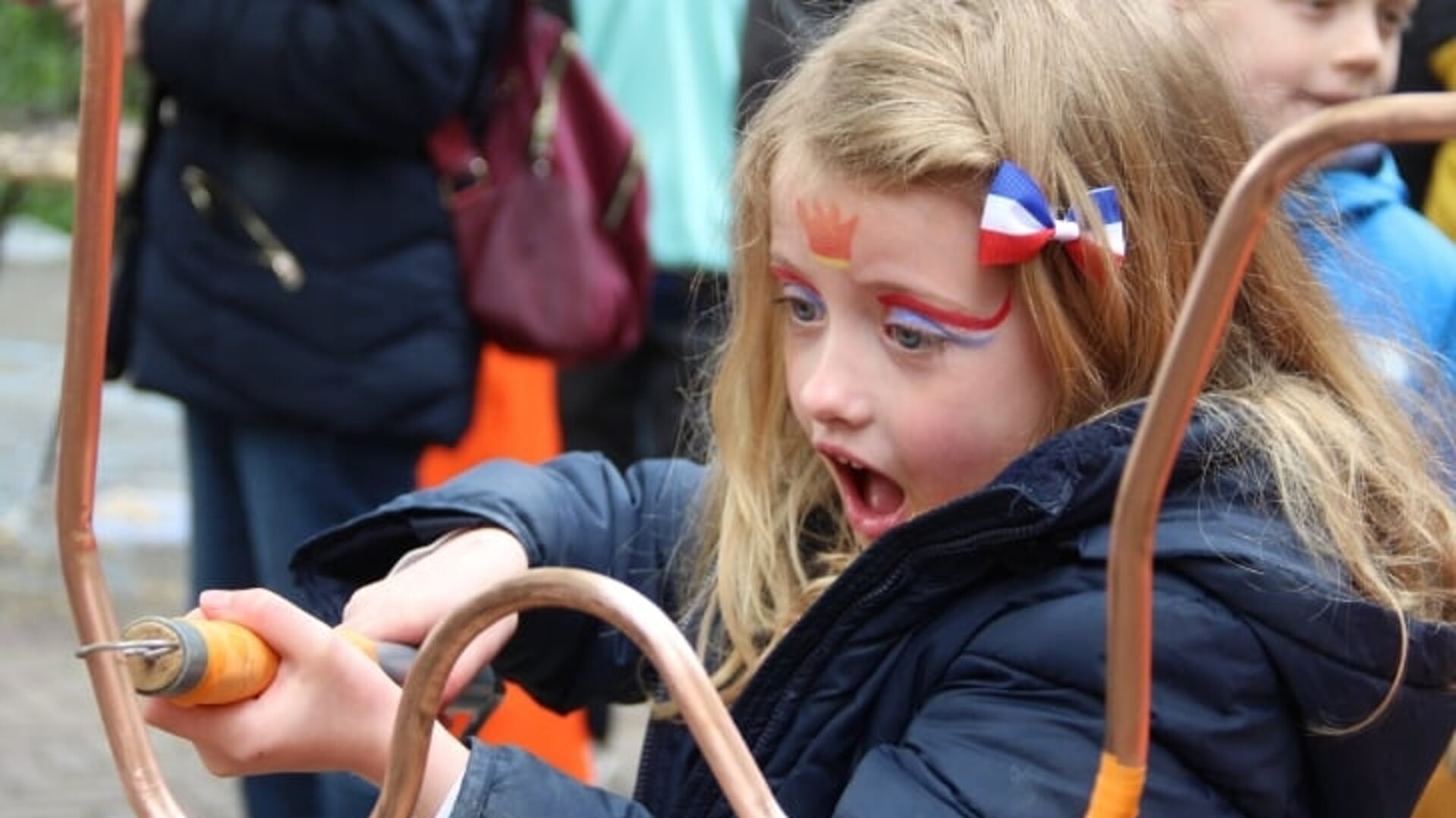 Tijdens de Oranjedag kun je bij TAS diverse leuke spelletjes doen.