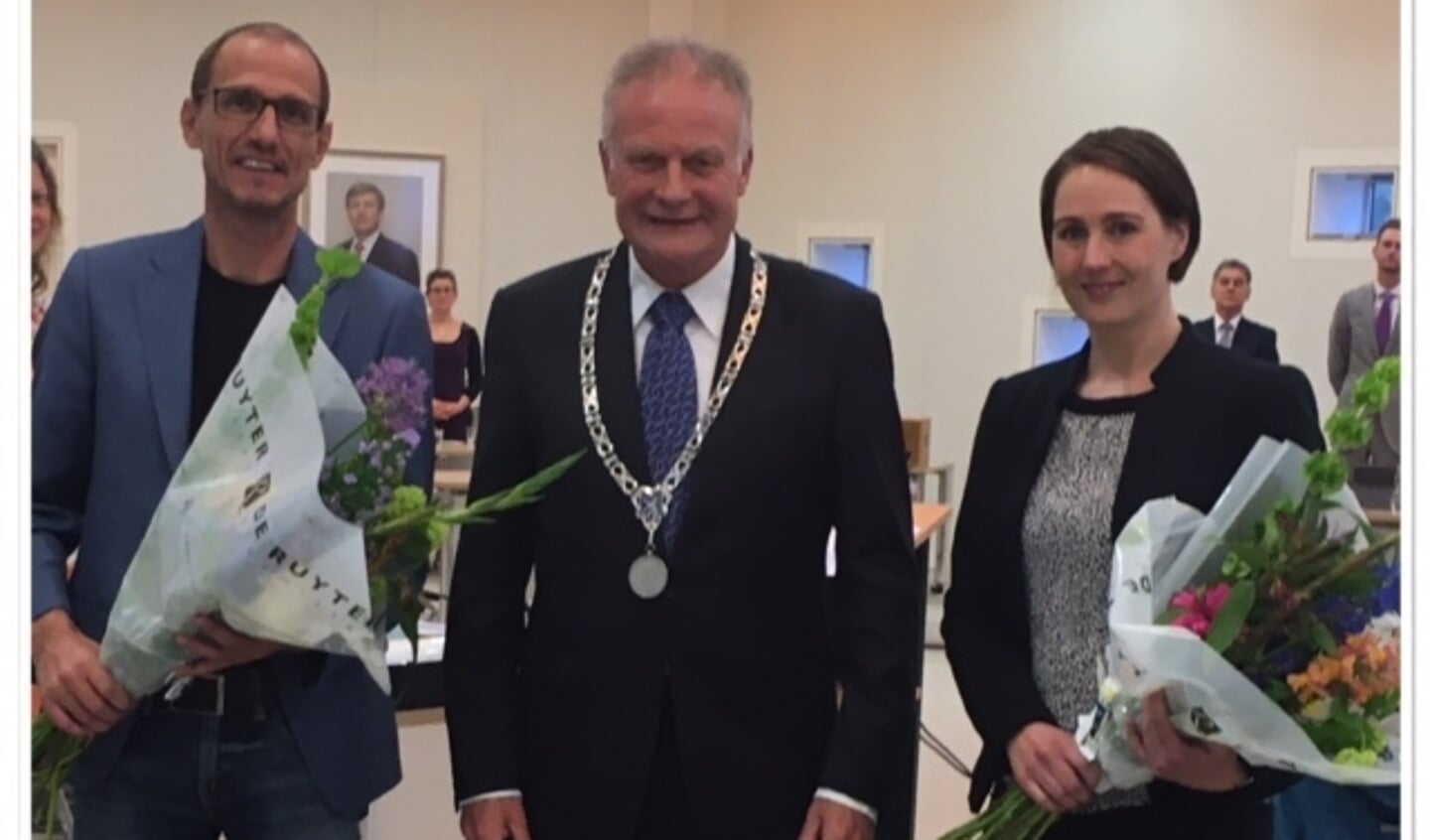 VVD'ers Frank Hermans en Brandy de Groot samen met burgemeester Sicko Heldoorn.