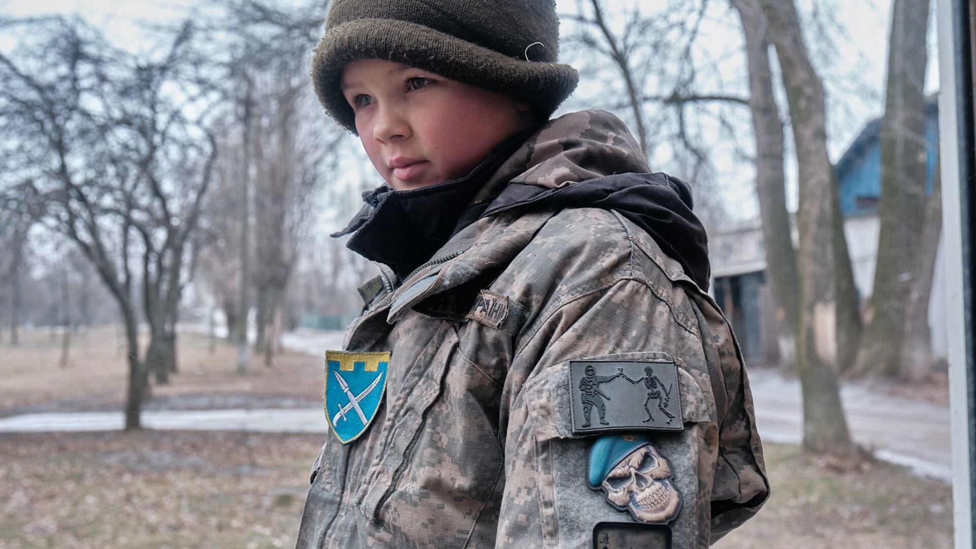 Een van de kansarme kinderen in het Oostfront van Oekraïne.