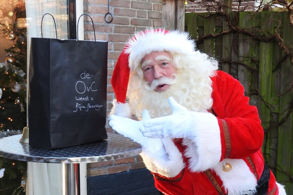 Kerstman Hein Poel, wenst iedereen namens het OVC de Voedselbank en Rodi een fijne kerst!