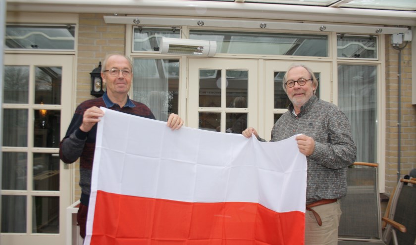 Wout Dijkshoorn en Hermen Kerssies met de Poolse vlag.
