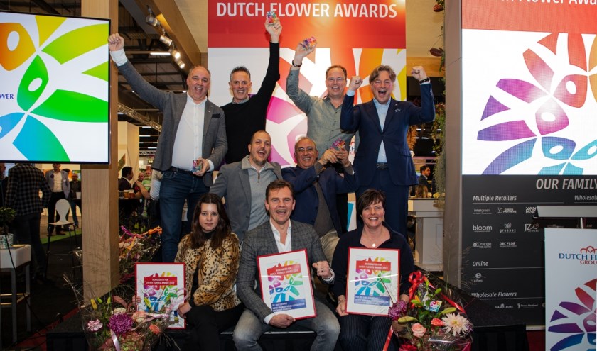 Marcel Zandvliet, (inksboven) en Marco van Zijverden (rechtsboven) van DFG met de winnaars.
