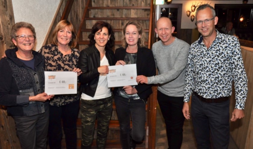 De organisatie van de Bradelierloop heeft weer twee goede doelen verblijd met een cheque.