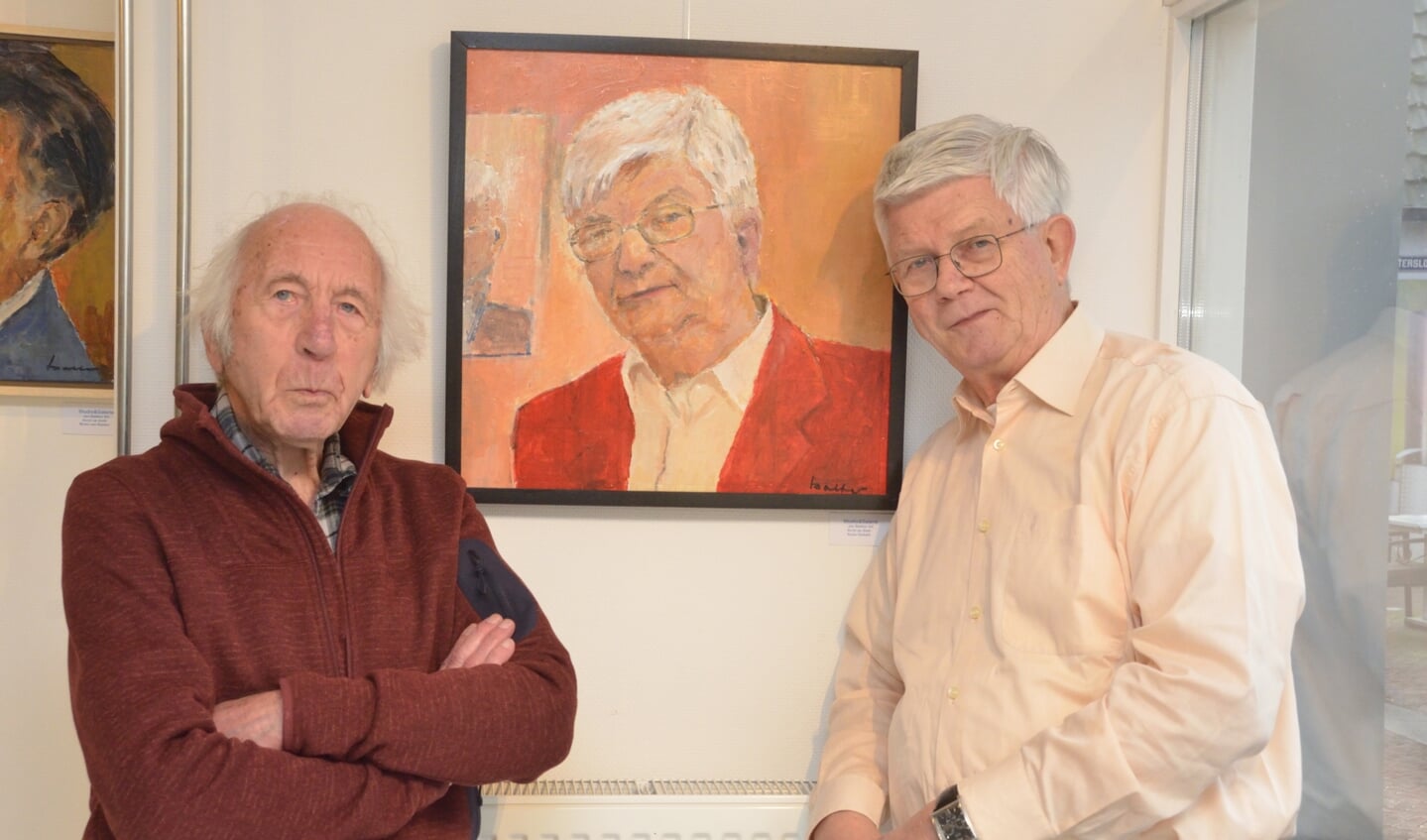 Jan Bakker en Koos Verkerk bij het op verzoek van Koos gemaakte schilderij.