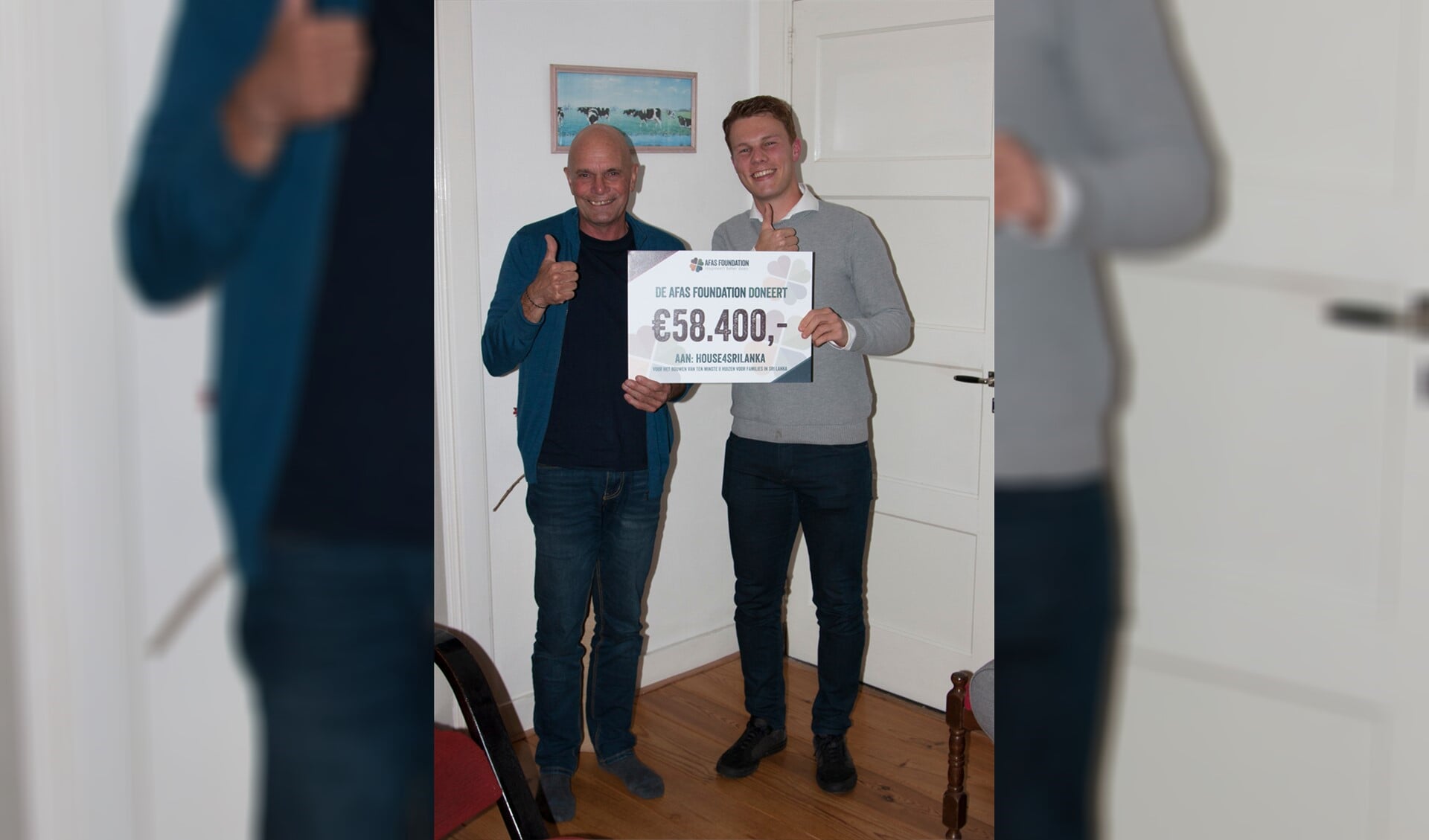 Henk Snijders (links) en Tim van AFAS Foundation met de royale cheque.