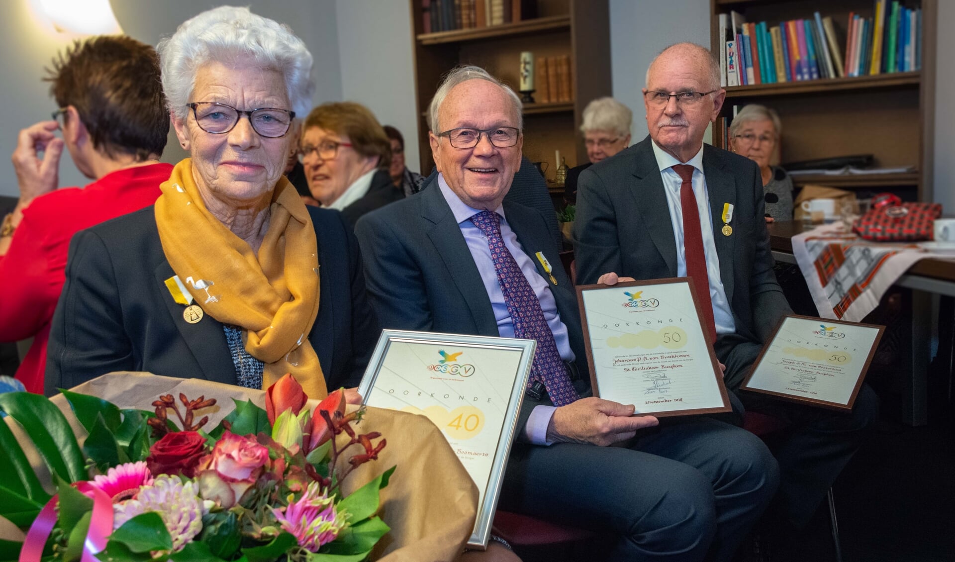 Vlnr: Naantje van den Broek (75) , Jan van Broekhoven (74)  en Joop van Oosterhout (75).