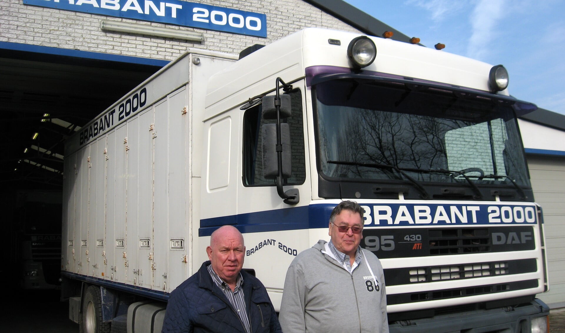 De bestuursleden Christ van der Linden (links) en Kees Godschalk bij de vrachtwagenloods in Rucphen. FOTO JOS OONINCX