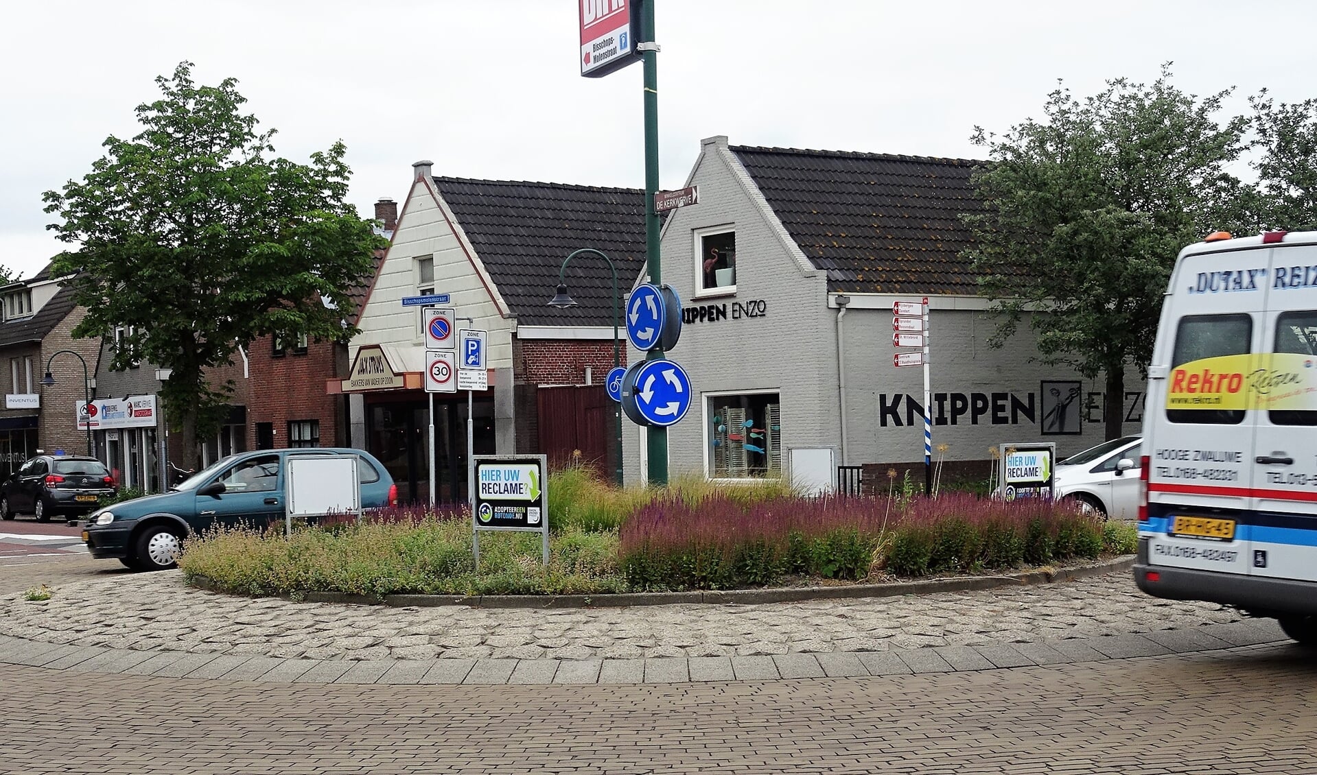 Het bord op de rotonde Beiaard-Bisschopsmolenstraat-Rode Poort.