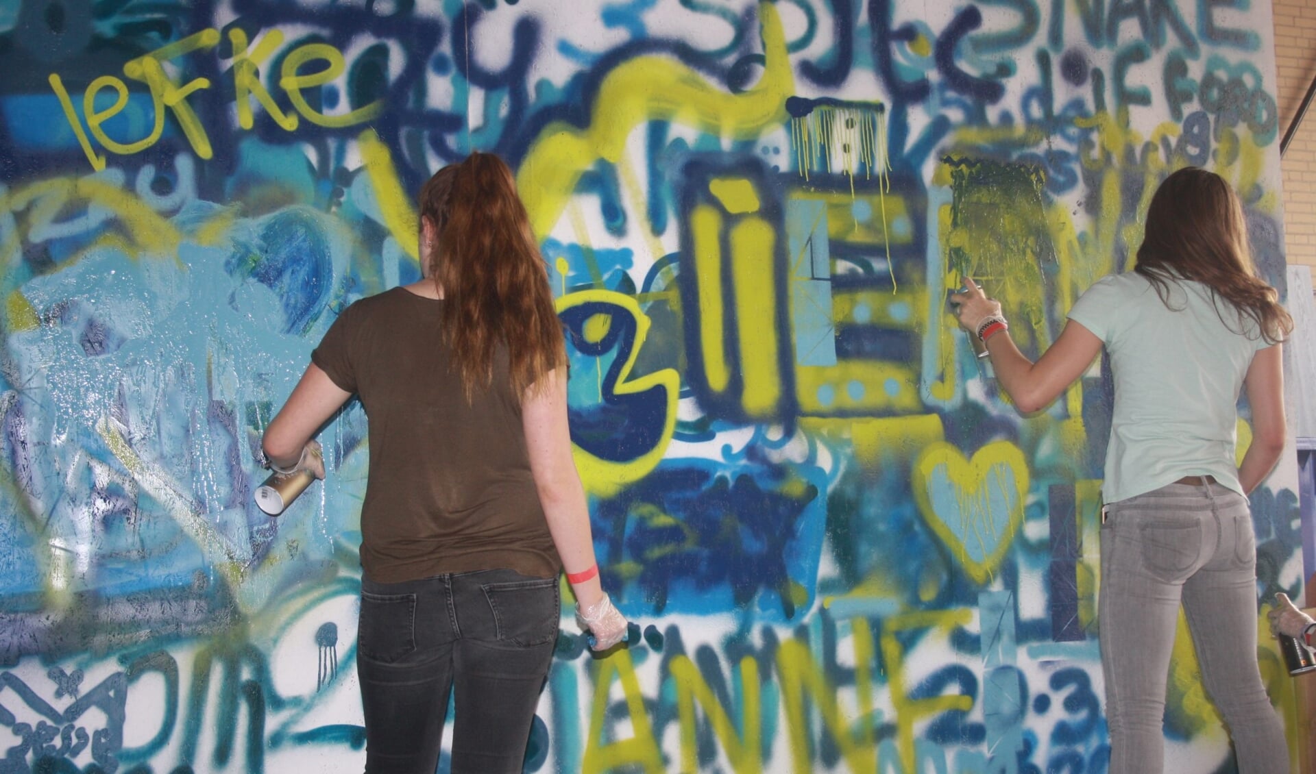 Eén van de workshops is graffiti spuiten