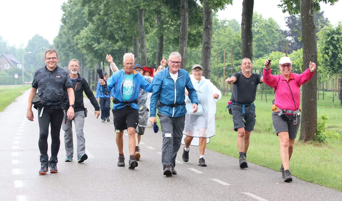Blije deelnemers tijdens de Kennedymars van 2019.