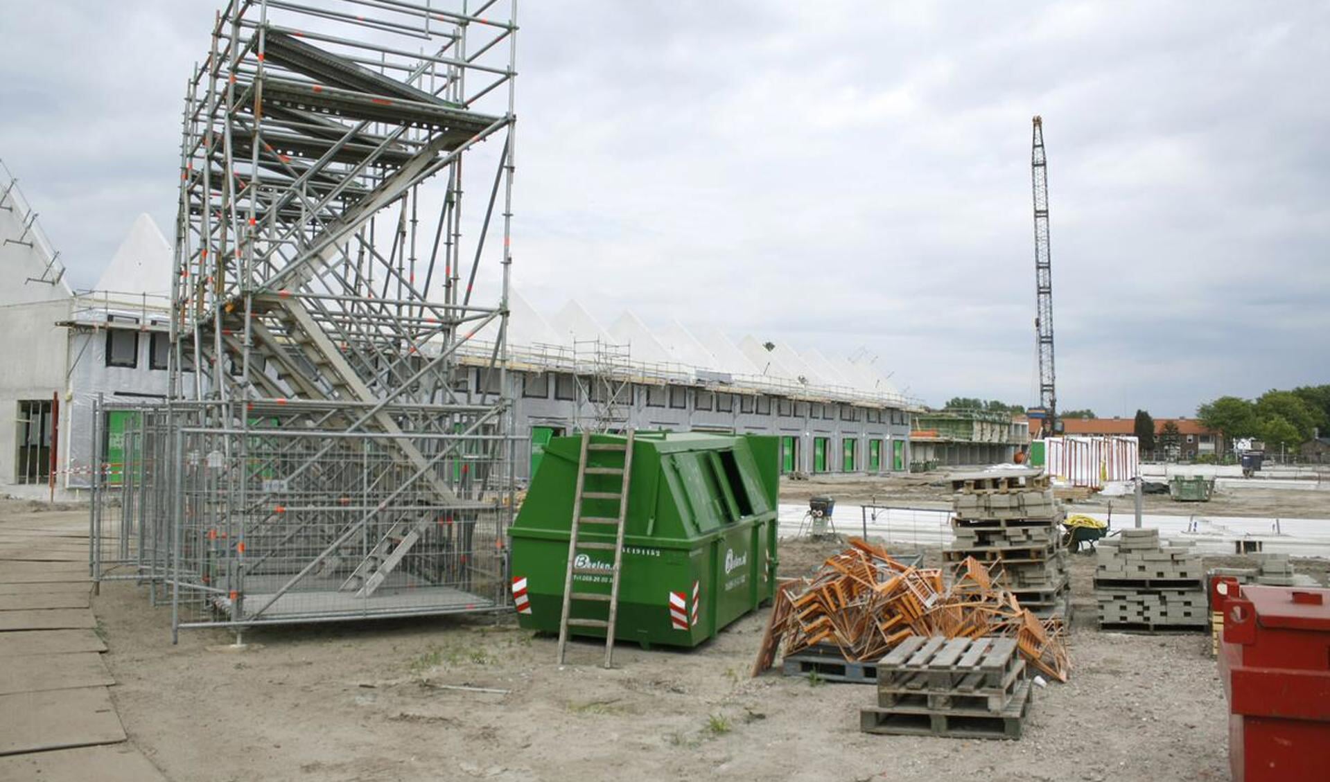 De bouw aan 123 Sprong vordert gestaag. Begin juli gingen veertien woningen in de verkoop. foto Wijnand Nijs