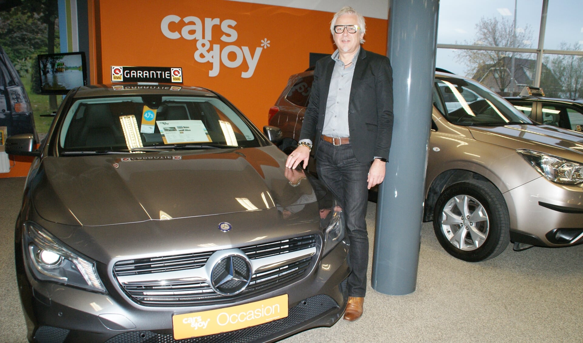 Directeur Leo Harteveld, tevreden met de aansluiting van zijn bedrijf bij Cars&Joy.