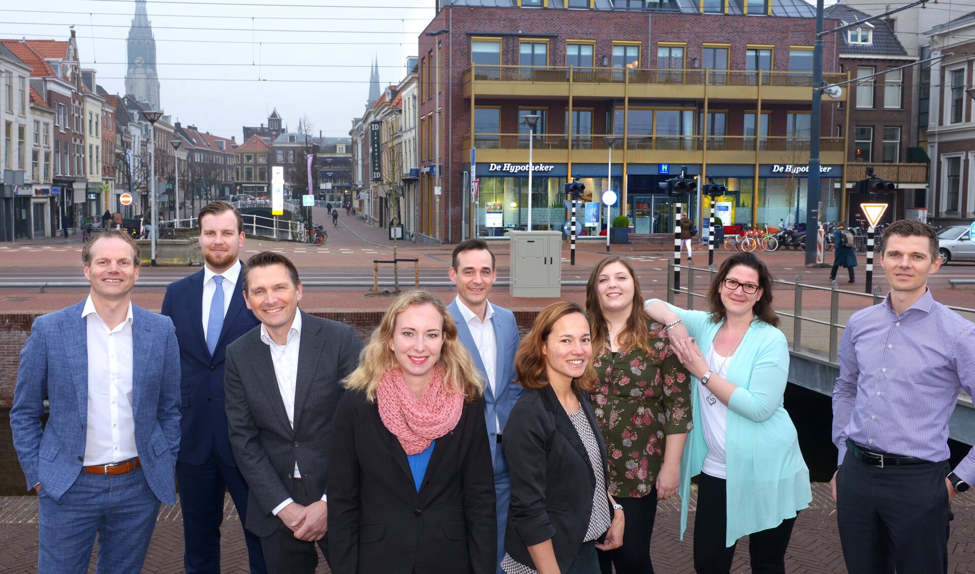 Het team van De Hypotheker Delft, vlnr Harpert, Rick, Olaf, Sascha, Michel, Sapoeti, Megan, Sanne en Arjan.