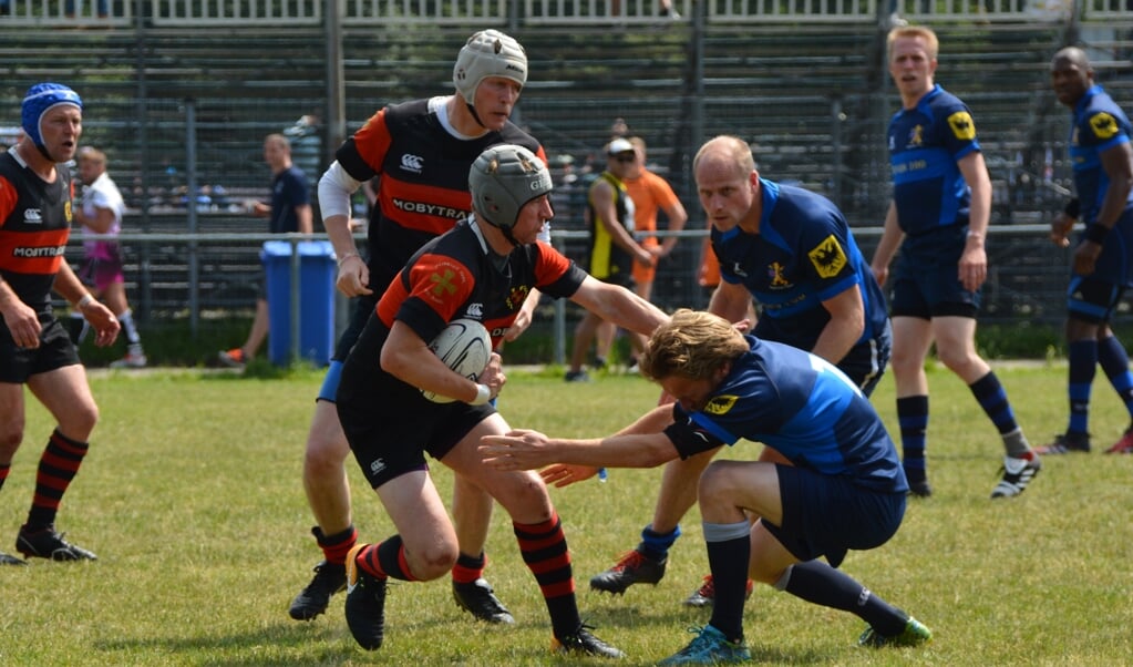 De Old Tigers (rood-zwarte tenue) van DSR-C in actie