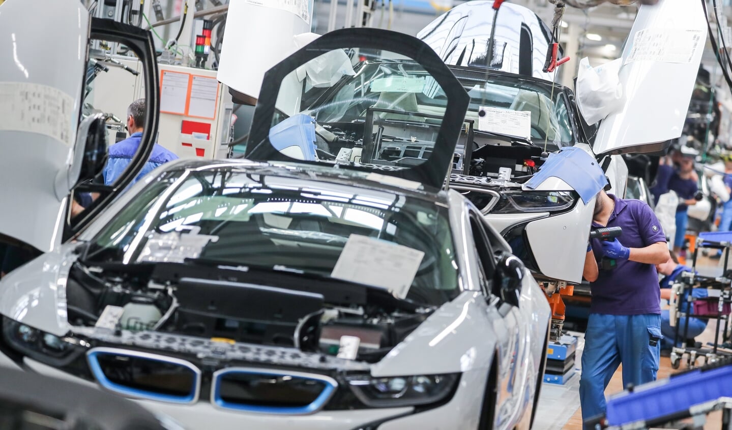 Travlheden er igen så småt ved at indfinde sig bed samlebåndene hos BMW. Foto: Jan Woitas/dpa.