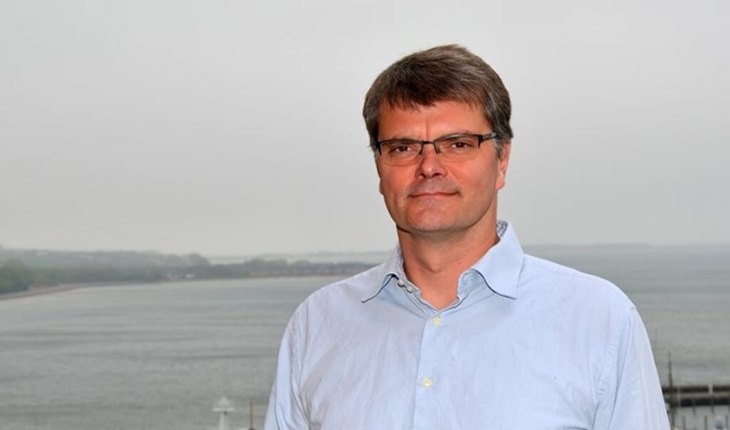 Teamleder Thorsten Piontkowitz fra Kystdirektoratet i Danmark fortalte de mere end hundrede tyske eksperter til klimakonferencen i Husum om den danske portal Kystplanlægger. (Kystdirektoratet)