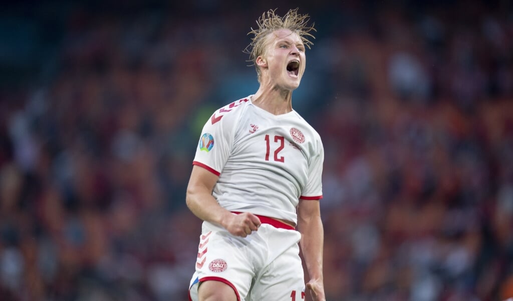 Kasper Dolberg, som her ses juble over scoringen til 2-0, havde en god aften på sin gamle hjemmebane i Amsterdam. Dolberg scorede to mål i 4-0-sejren over Wales og sendte Danmark i EM-kvartfinalen. (Liselotte Sabroe/Ritzau Scanpix)