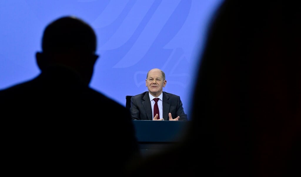 Kansler Olaf Scholz (SPD) inviterede fredag til pressemøde efter mødet med ministerpræsidenterne.   ( John Macdougall/AFP Pool/dpa)