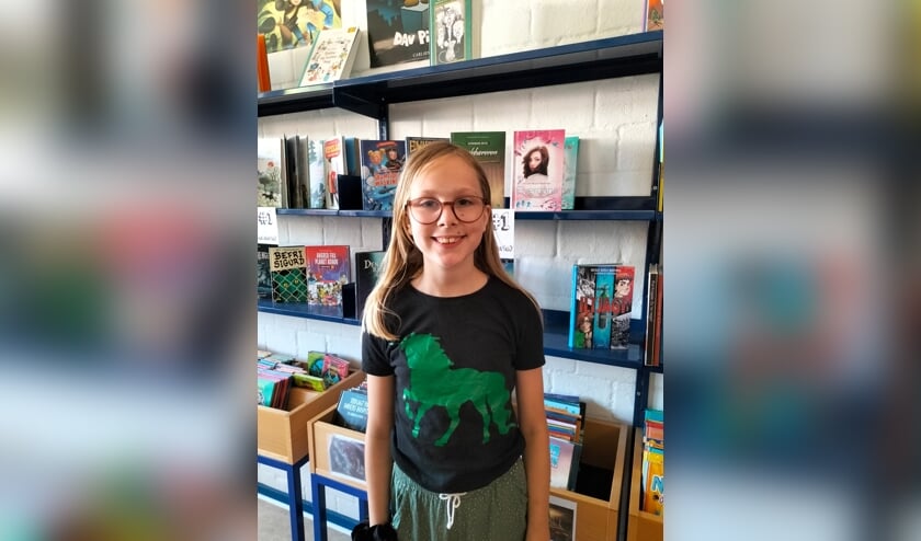 Frida Wappler på 10 år elsker Harry Potter-bøger og Jumbo-bøgerne om Anders And. 